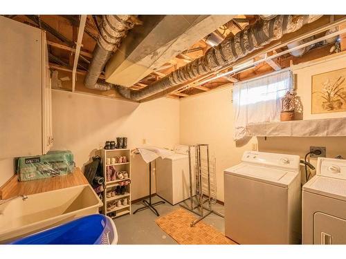 17 Bernard Drive Nw, Calgary, AB - Indoor Photo Showing Laundry Room