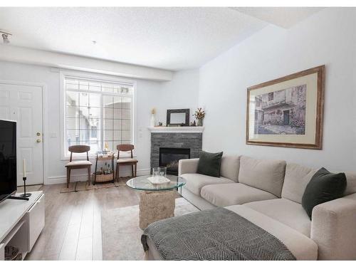 223-527 15 Avenue Sw, Calgary, AB - Indoor Photo Showing Living Room With Fireplace