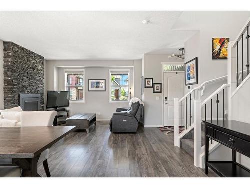 270 Marquis Court Se, Calgary, AB - Indoor With Fireplace