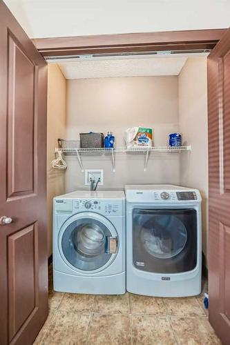 156 Saddlebrook Circle Ne, Calgary, AB - Indoor Photo Showing Laundry Room