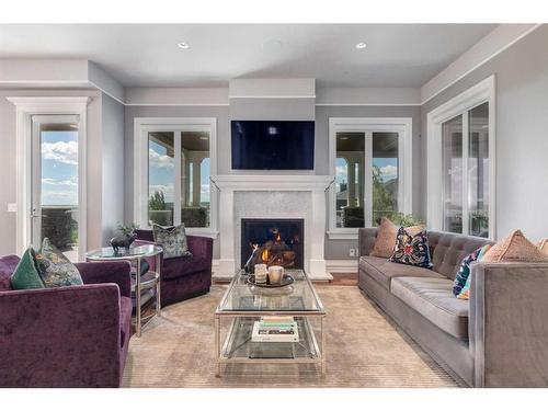 7 Timberline Gate Sw, Calgary, AB - Indoor Photo Showing Living Room With Fireplace