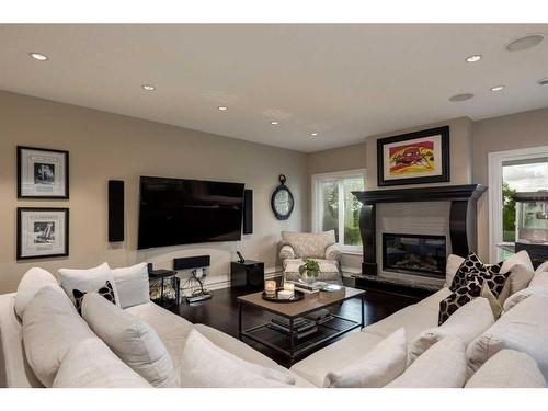 7 Timberline Gate Sw, Calgary, AB - Indoor Photo Showing Living Room With Fireplace