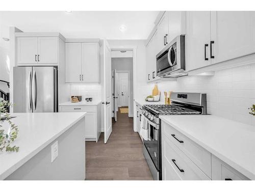 55 Amblehurst Link Nw, Calgary, AB - Indoor Photo Showing Kitchen With Upgraded Kitchen