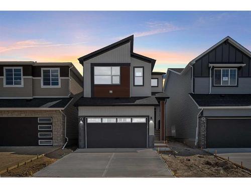 55 Amblehurst Link Nw, Calgary, AB - Outdoor With Facade