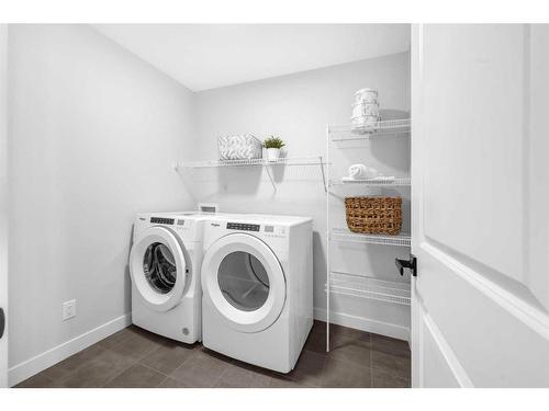 55 Amblehurst Link Nw, Calgary, AB - Indoor Photo Showing Laundry Room