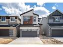 55 Amblehurst Link Nw, Calgary, AB  - Outdoor With Facade 