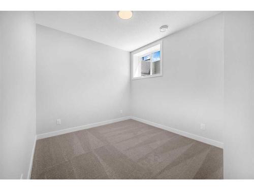 55 Amblehurst Link Nw, Calgary, AB - Indoor Photo Showing Other Room