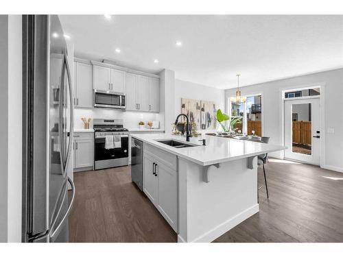 55 Amblehurst Link Nw, Calgary, AB - Indoor Photo Showing Kitchen With Double Sink With Upgraded Kitchen