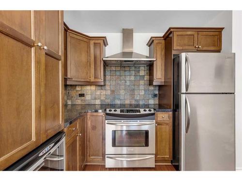 401-716 5 Street Ne, Calgary, AB - Indoor Photo Showing Kitchen With Stainless Steel Kitchen With Double Sink