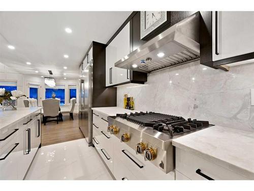 108 Patterson Drive Sw, Calgary, AB - Indoor Photo Showing Kitchen With Upgraded Kitchen