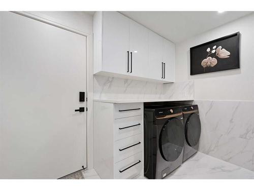108 Patterson Drive Sw, Calgary, AB - Indoor Photo Showing Laundry Room