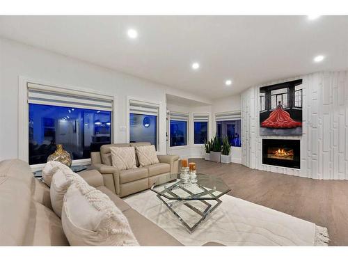 108 Patterson Drive Sw, Calgary, AB - Indoor Photo Showing Living Room With Fireplace