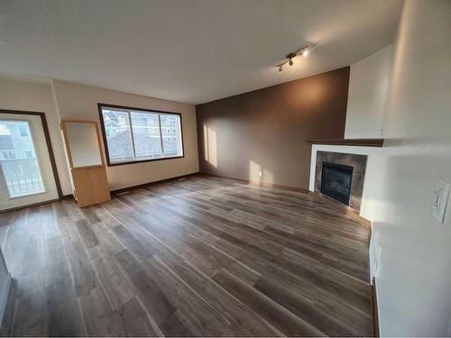 213 Blue Jay Road, Fort Mcmurray, AB - Indoor With Fireplace
