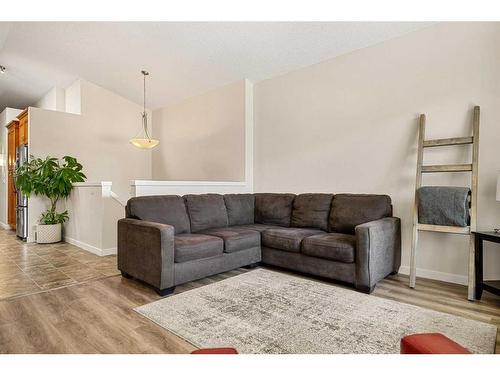 1338 New Brighton Park Se, Calgary, AB - Indoor Photo Showing Living Room