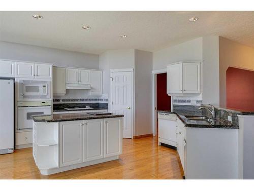 87-99 Christie Point Sw, Calgary, AB - Indoor Photo Showing Kitchen With Double Sink