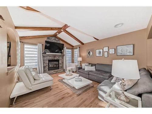 192 Brightondale Close Se, Calgary, AB - Indoor Photo Showing Living Room With Fireplace