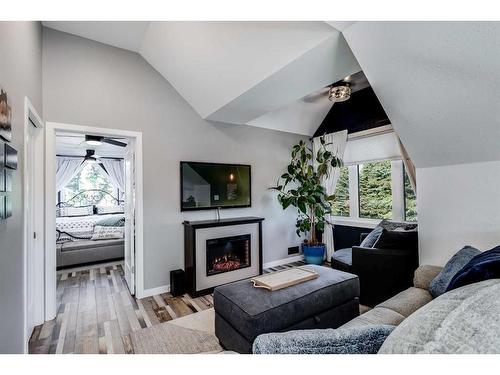 9-41124 Range Road 282, Rural Lacombe County, AB - Indoor Photo Showing Living Room With Fireplace