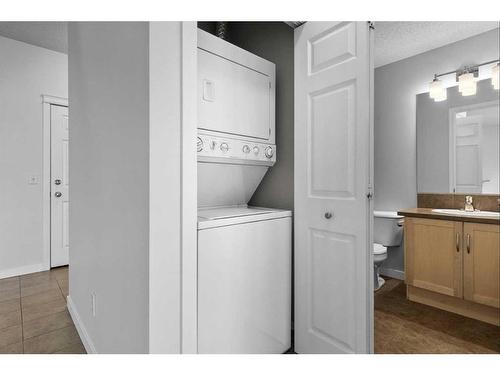 1411-5 Country Village Park Ne, Calgary, AB - Indoor Photo Showing Laundry Room