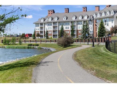 1411-5 Country Village Park Ne, Calgary, AB - Outdoor With Body Of Water With Facade