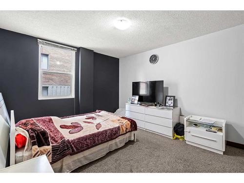 202-515 57 Avenue Sw, Calgary, AB - Indoor Photo Showing Bedroom