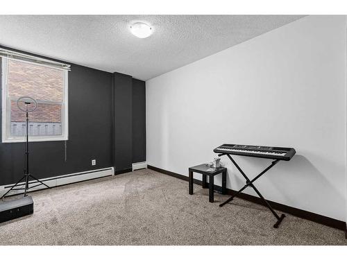 202-515 57 Avenue Sw, Calgary, AB - Indoor Photo Showing Other Room