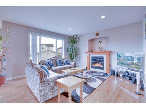 377 Taralake Landing Ne, Calgary, AB - Indoor Photo Showing Living Room With Fireplace