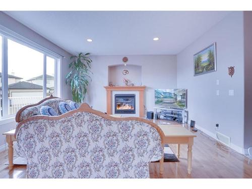 377 Taralake Landing Ne, Calgary, AB - Indoor Photo Showing Bedroom With Fireplace