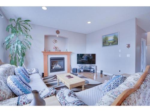 377 Taralake Landing Ne, Calgary, AB - Indoor Photo Showing Living Room With Fireplace