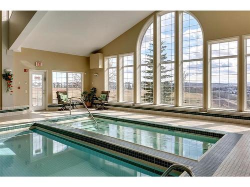 295-223 Tuscany Springs Boulevard Nw, Calgary, AB - Indoor Photo Showing Other Room With In Ground Pool