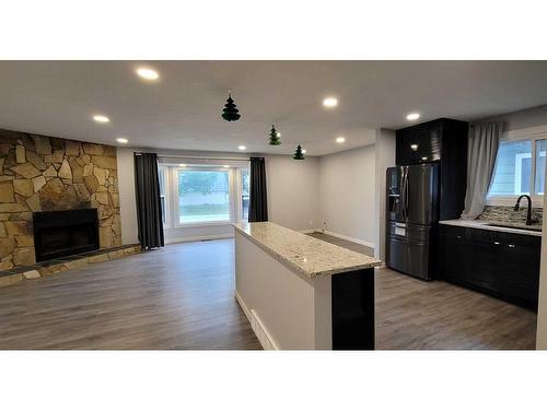 4511 26 Avenue Se, Calgary, AB - Indoor With Fireplace