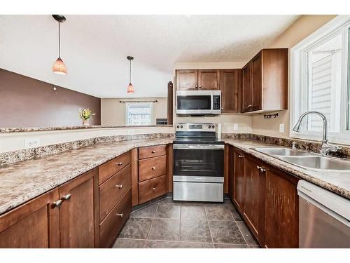 1419-16320 24 Street Sw, Calgary, AB - Indoor Photo Showing Kitchen With Double Sink