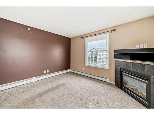 1419-16320 24 Street Sw, Calgary, AB - Indoor With Fireplace