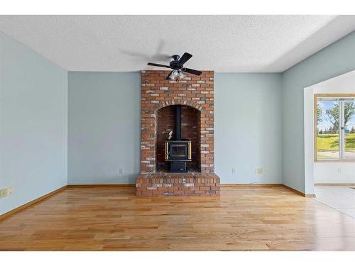 156 Riverbrook Way Se, Calgary, AB - Indoor Photo Showing Other Room With Fireplace