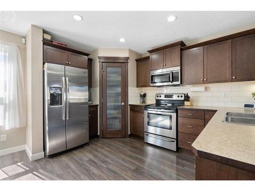 14 Ravenswynd Rise Se, Airdrie, AB - Indoor Photo Showing Kitchen With Double Sink