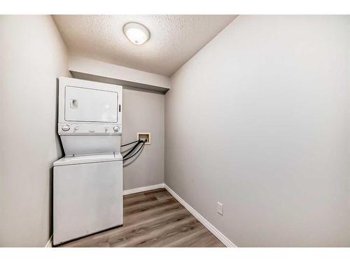 209-630 8 Avenue Se, Calgary, AB - Indoor Photo Showing Laundry Room