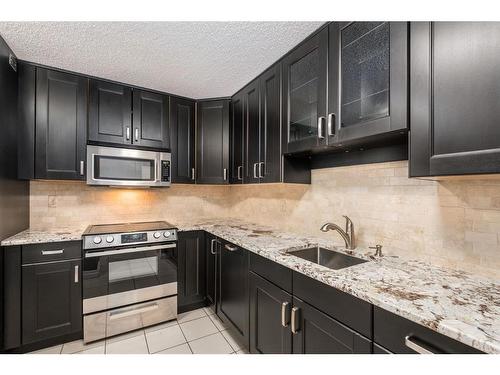 506-1011 12 Avenue Sw, Calgary, AB - Indoor Photo Showing Kitchen With Upgraded Kitchen