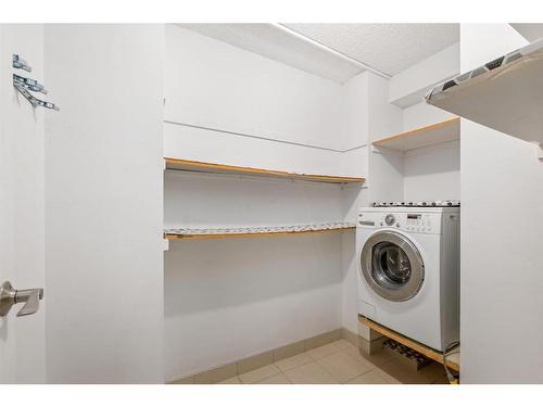 506-1011 12 Avenue Sw, Calgary, AB - Indoor Photo Showing Laundry Room