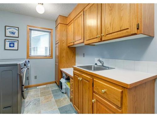 134 Scenic Park Crescent Nw, Calgary, AB - Indoor Photo Showing Laundry Room