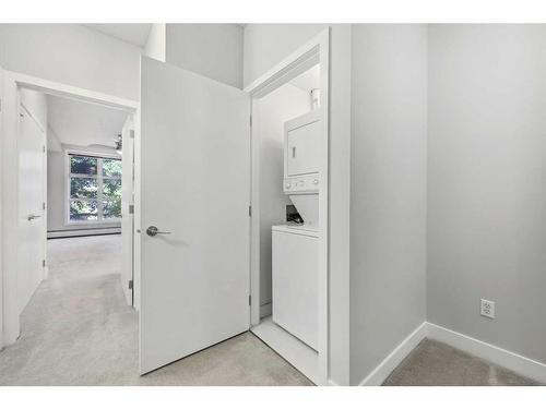 130-315 24 Avenue Sw, Calgary, AB - Indoor Photo Showing Laundry Room