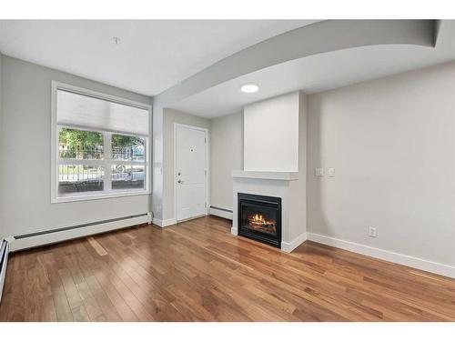 130-315 24 Avenue Sw, Calgary, AB - Indoor With Fireplace