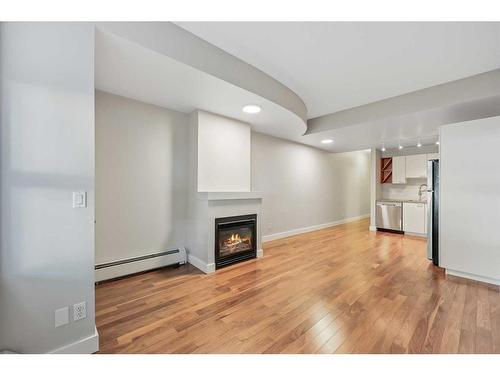 130-315 24 Avenue Sw, Calgary, AB - Indoor With Fireplace