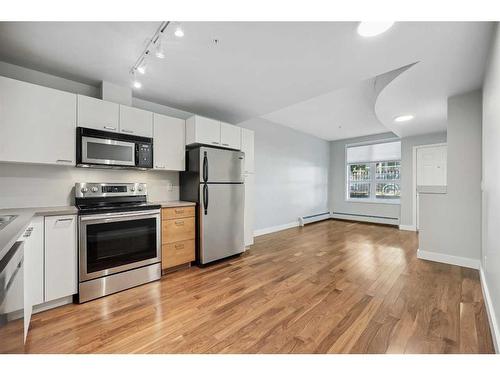 130-315 24 Avenue Sw, Calgary, AB - Indoor Photo Showing Kitchen With Stainless Steel Kitchen