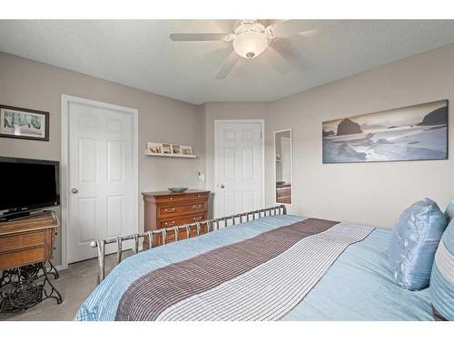 115 Prestwick Acres Lane Se, Calgary, AB - Indoor Photo Showing Bedroom