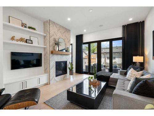 2040 44 Avenue Sw, Calgary, AB - Indoor Photo Showing Living Room With Fireplace