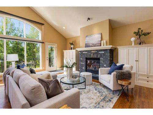 241 Elbow Ridge Haven, Rural Rocky View County, AB - Indoor Photo Showing Living Room With Fireplace