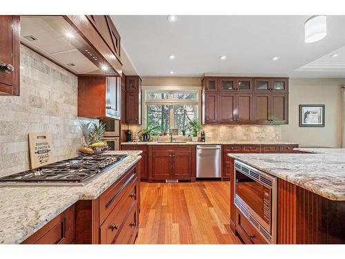 97 Posthill Drive Sw, Calgary, AB - Indoor Photo Showing Kitchen With Upgraded Kitchen