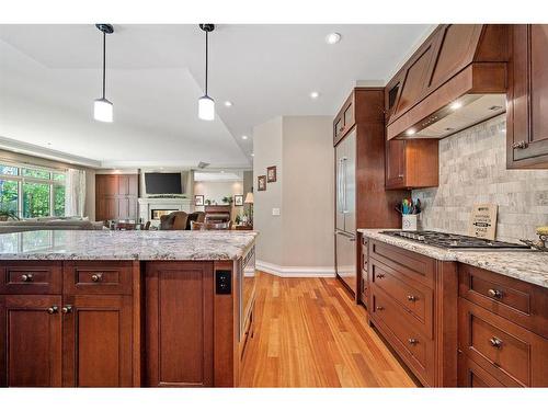 97 Posthill Drive Sw, Calgary, AB - Indoor Photo Showing Kitchen With Upgraded Kitchen