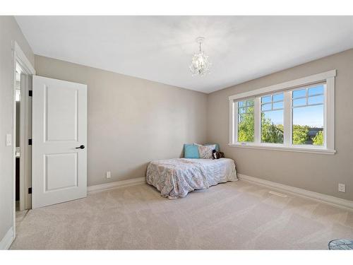 97 Posthill Drive Sw, Calgary, AB - Indoor Photo Showing Bedroom