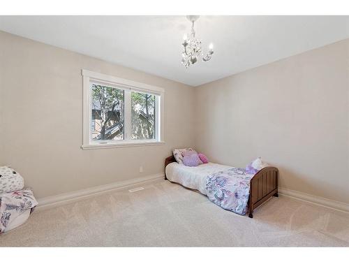 97 Posthill Drive Sw, Calgary, AB - Indoor Photo Showing Bedroom