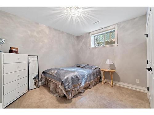 97 Posthill Drive Sw, Calgary, AB - Indoor Photo Showing Bedroom